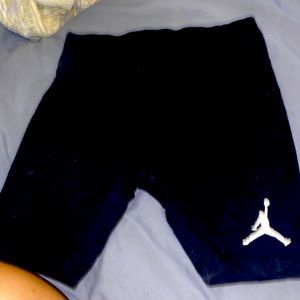 Black Jordan shorts.